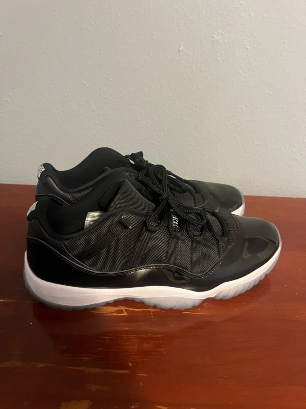Jordan Men's Black and White Low-Top Retro 11 space jam